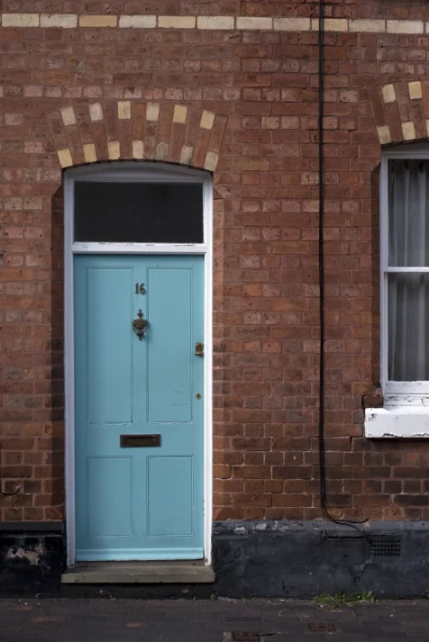 A teal door in Chester, England, 2017.