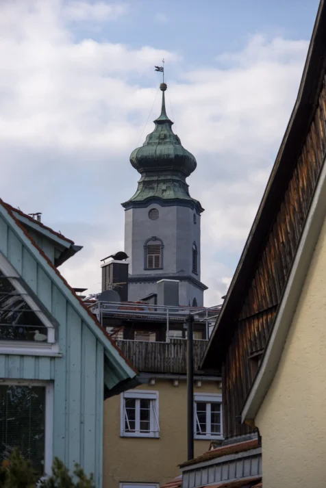 A tower and assorted houses in Lindau, Germany, 2023.