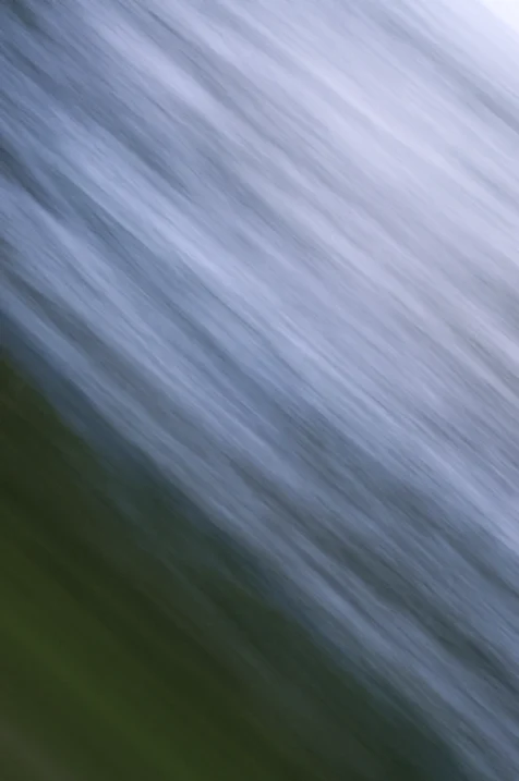 Long exposure of trees and sky captured from a moving car, 2015.