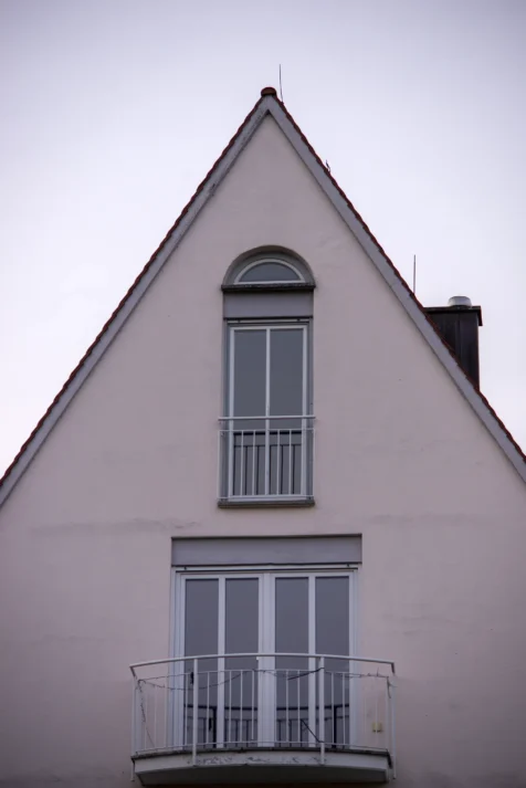A triangular building at dusk in Ulm, Germany, 2023.