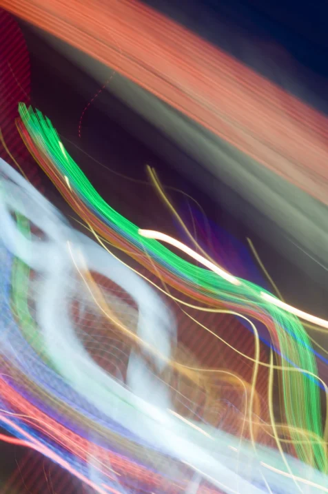 Long exposure of vibrant lights captured from a moving bus at night, 2015.