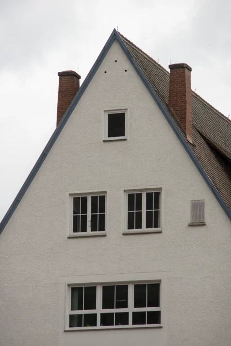 Windows on a big white house in Blaubeuren, Germany, 2023.