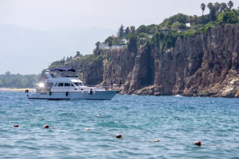 A yacht returns to port in Antalya, Turkey, 2023.