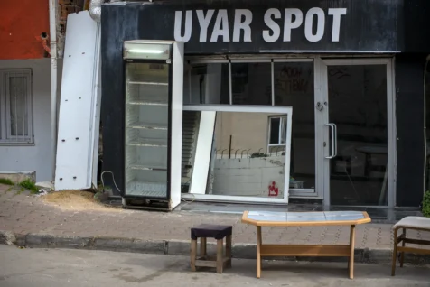 Assorted items near a storefront in Antalya, Turkey, 2024.