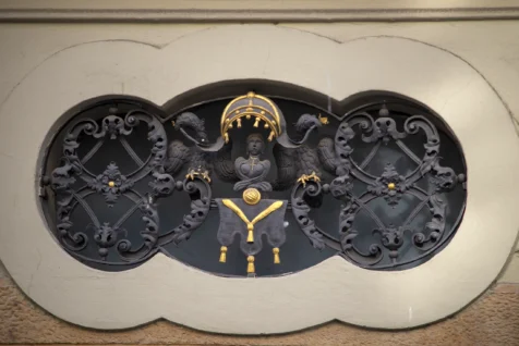 Ornate metal decoration on a building in Prague, Czech Republic.