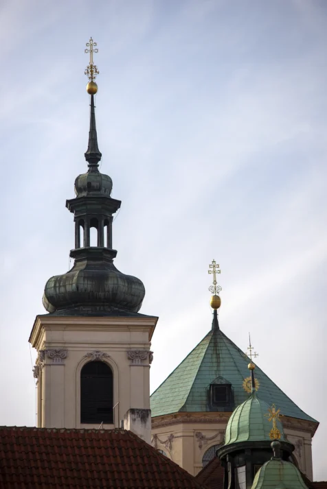 Crosses atop buildings in Prague, Czech Republic.