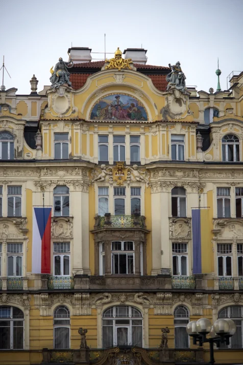 Czech and Ukrainian flags hang from a building in Old Town, Prague, Czech Republic.