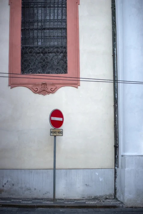A do not enter sign next to a church in Prague, Czech Republic.