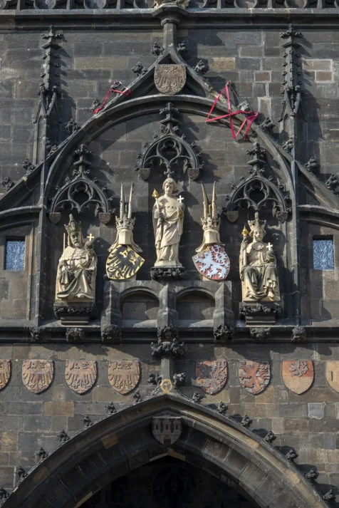 Statues on the Charles Bridge tower in Prague, Czech Republic.