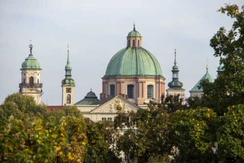 St. Francis of Assisi Church rooftops and foliage in Prague, Czech Republic.