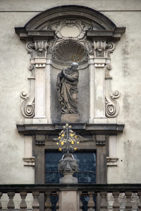 A statue on the Church of St. Salvator in Prague, Czech Republic.